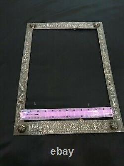 A beautiful very old Frame made from bronze with engravings of Mythological