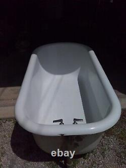 Antique Clawfoot tub 98 Years Old, Cast Iron, Porcelain Interior With 4 Feet