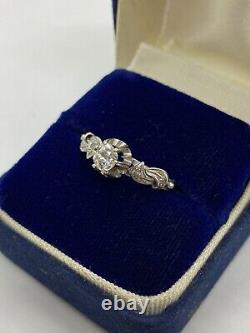 Antique beautiful engagement ring in platinum with a natural old cut diamond