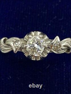 Antique beautiful engagement ring in platinum with a natural old cut diamond