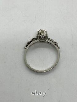 Antique beautiful engagement ring in platinum with a natural old cut diamond