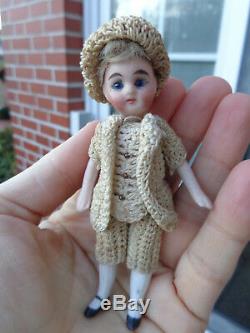 Antique dollhouse doll dated about 1900 mignonette with closed mouth & old dress