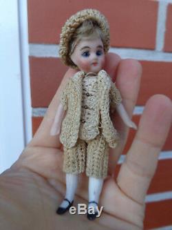 Antique dollhouse doll dated about 1900 mignonette with closed mouth & old dress