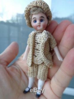 Antique dollhouse doll dated about 1900 mignonette with closed mouth & old dress