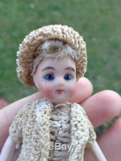 Antique dollhouse doll dated about 1900 mignonette with closed mouth & old dress