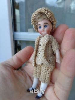 Antique dollhouse doll dated about 1900 mignonette with closed mouth & old dress