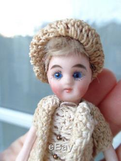 Antique dollhouse doll dated about 1900 mignonette with closed mouth & old dress