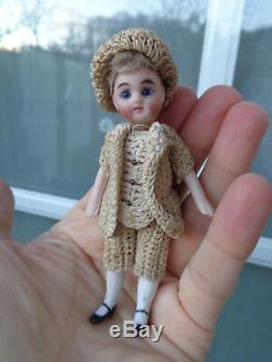 Antique dollhouse doll dated about 1900 mignonette with closed mouth & old dress